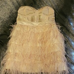 Like new bebe feather dress